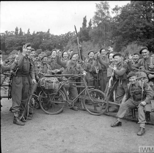 Imperial War Museum photo showing 45 RM Commando group iIn high spirits as they prepare to embark for the invasion, 3 June 1944. Lance Corporal H E Harden, VC, is in the right foreground.