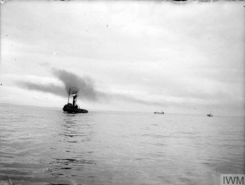 Tug towing LCT's during the trials.